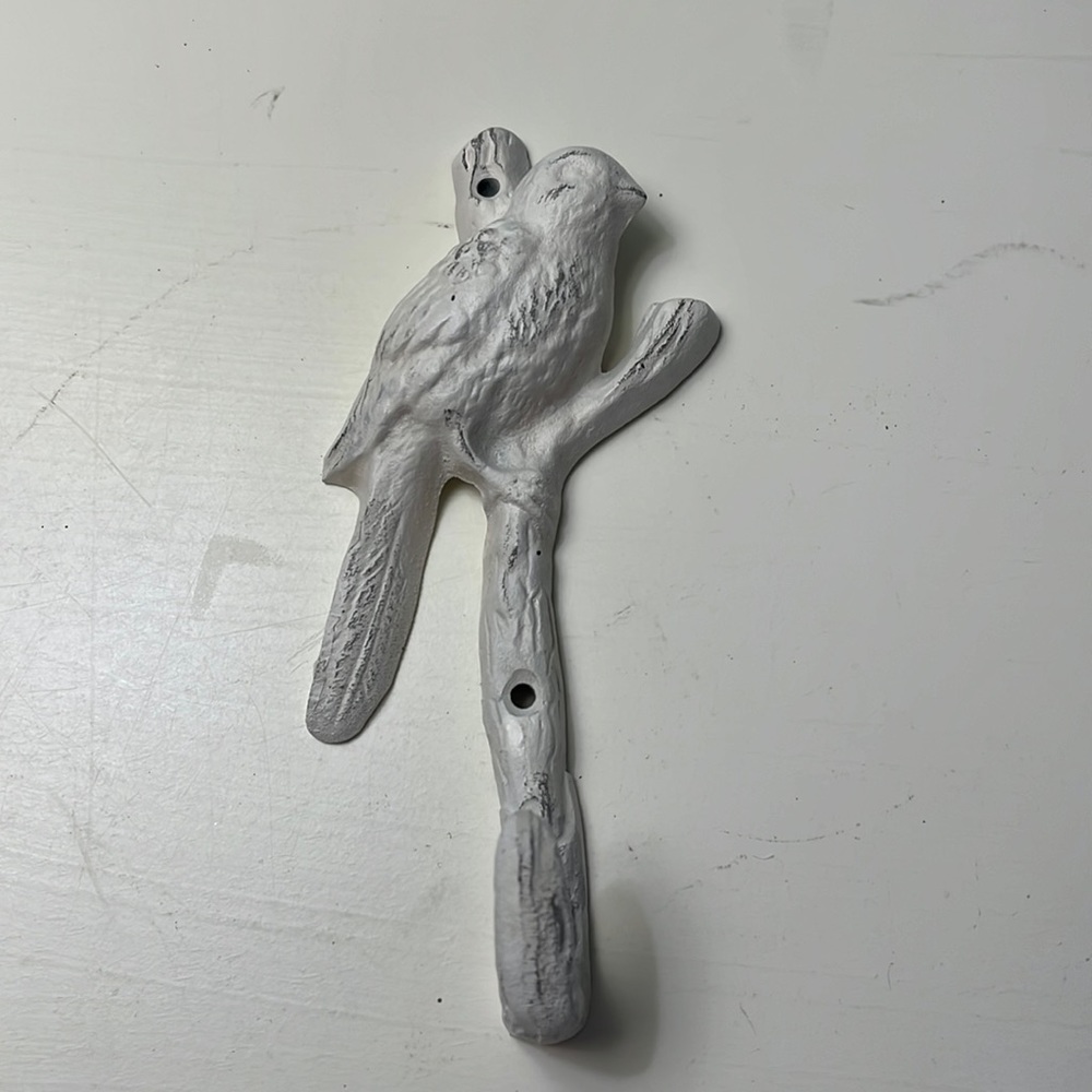 Bird and branch coat hook.